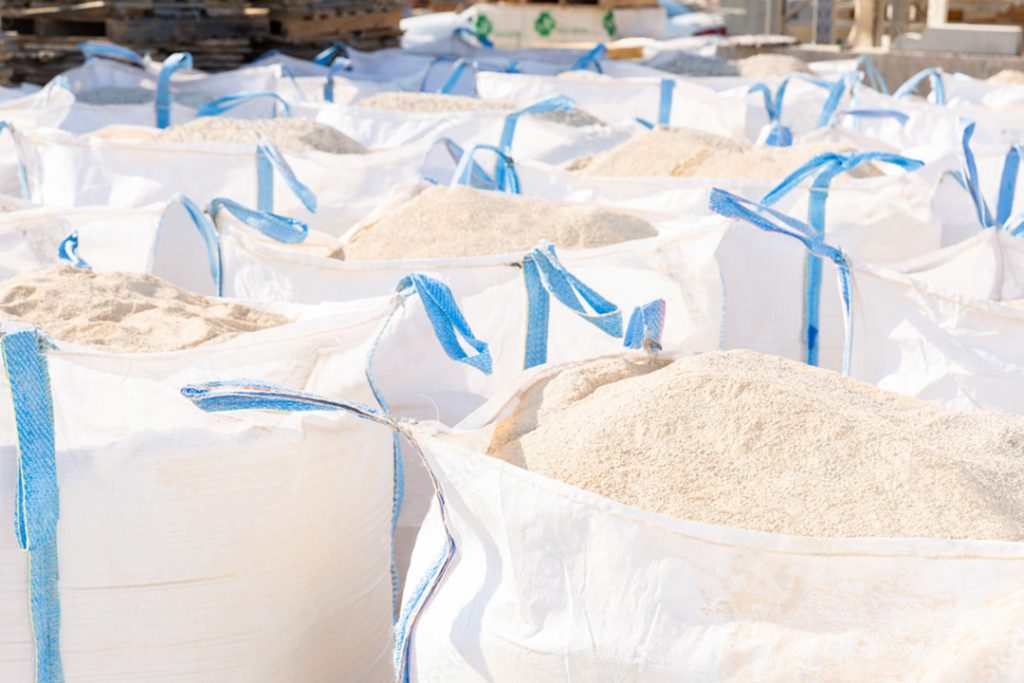 White bulk bags filled with sand