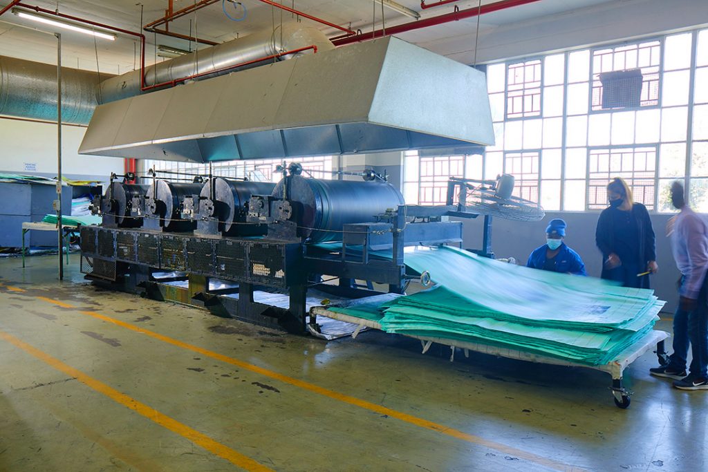 Finished bulk bags coming off of the printing press at custom bulk bags facility in Durban South Africa