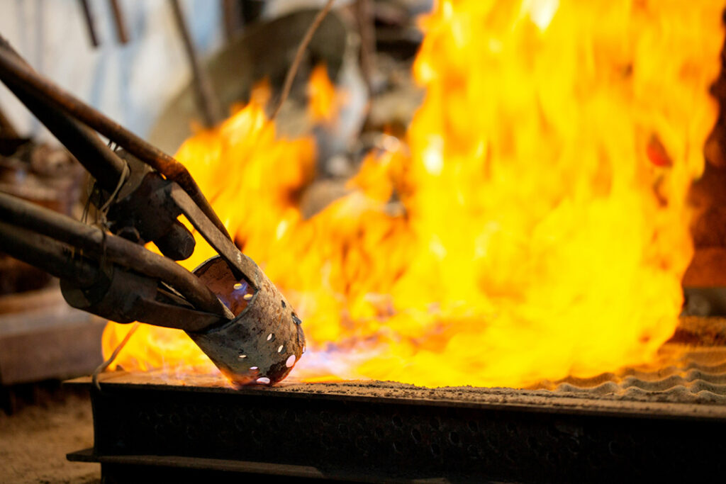 A blowtorch emitting flammable gas and flames.