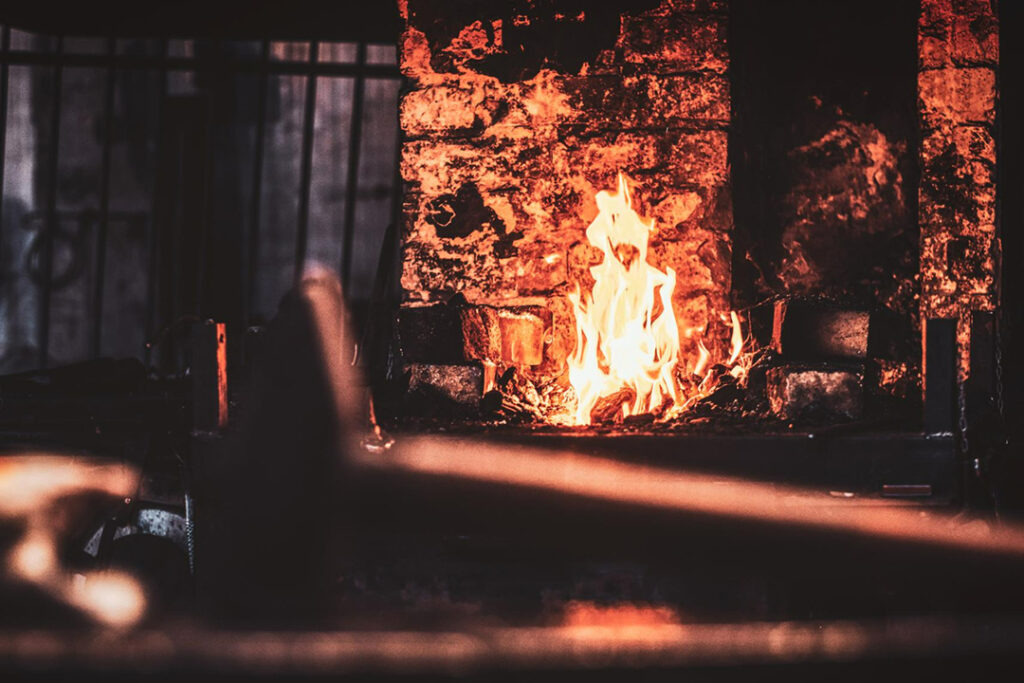 A hot temperature fire inside a furnace at an industrial facility.