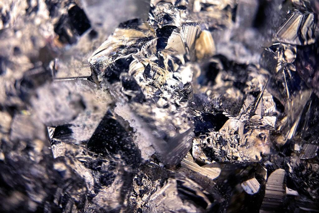 A close-up of vanadium metal, a steel-blue mineral found in South Africa.