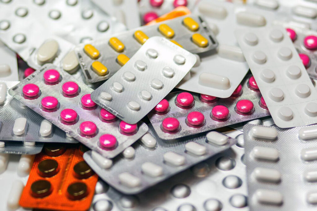 Multiple packs of pills in silver foil